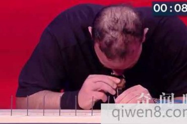 世界之最:男子两分钟用头钉38颗钉子